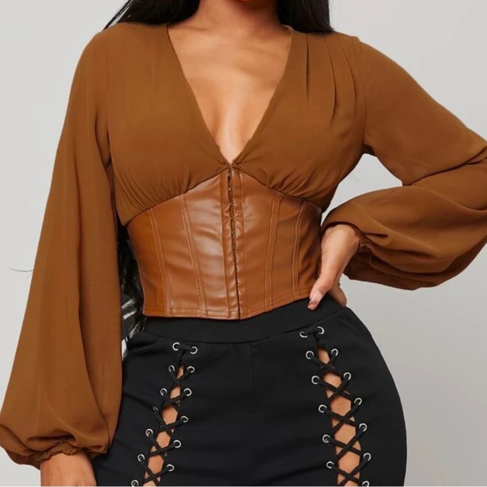 Lantern Sleeve PU Leather
Hem Blouse
